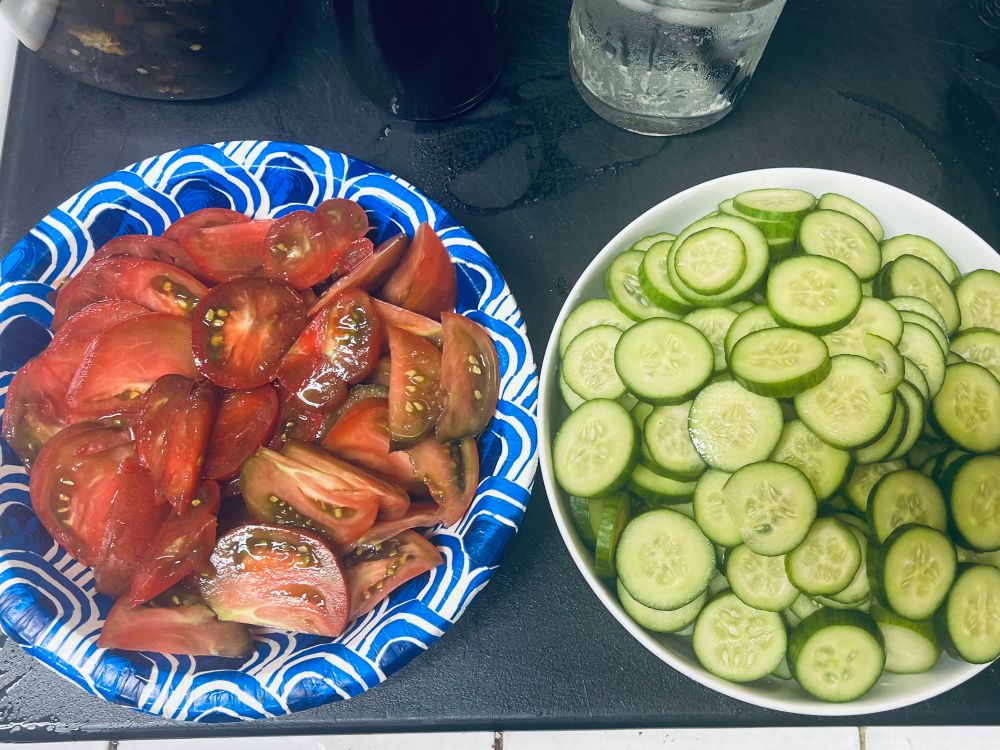 Sliced garden tomatoes and cucumbers 