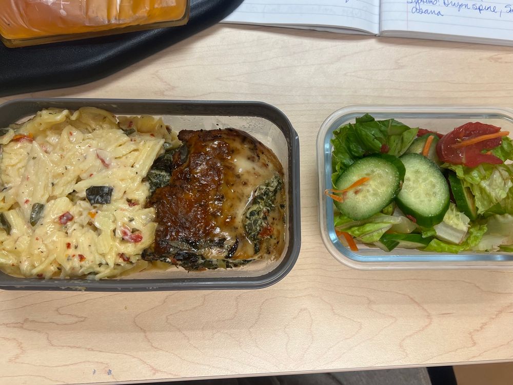 1/2 stuffed chicken breast, pasta, salad