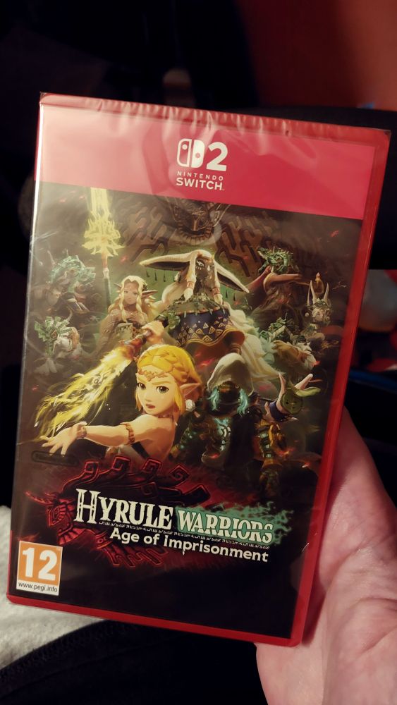 A physical copy of a Nintendo Switch 2 video game, Hyrule Warriors: Age of Imprisonment