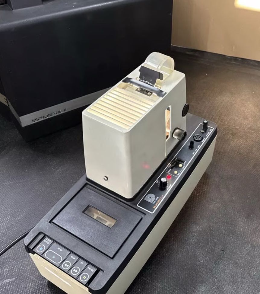 Filmstrip projector with cassette player. 