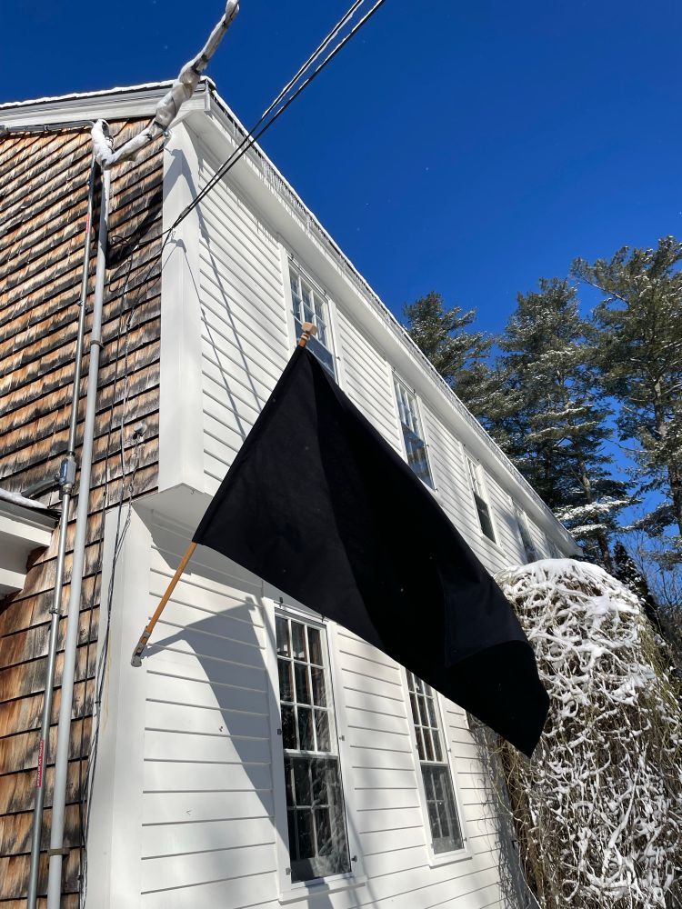 Black flag at the moment our democracy ended