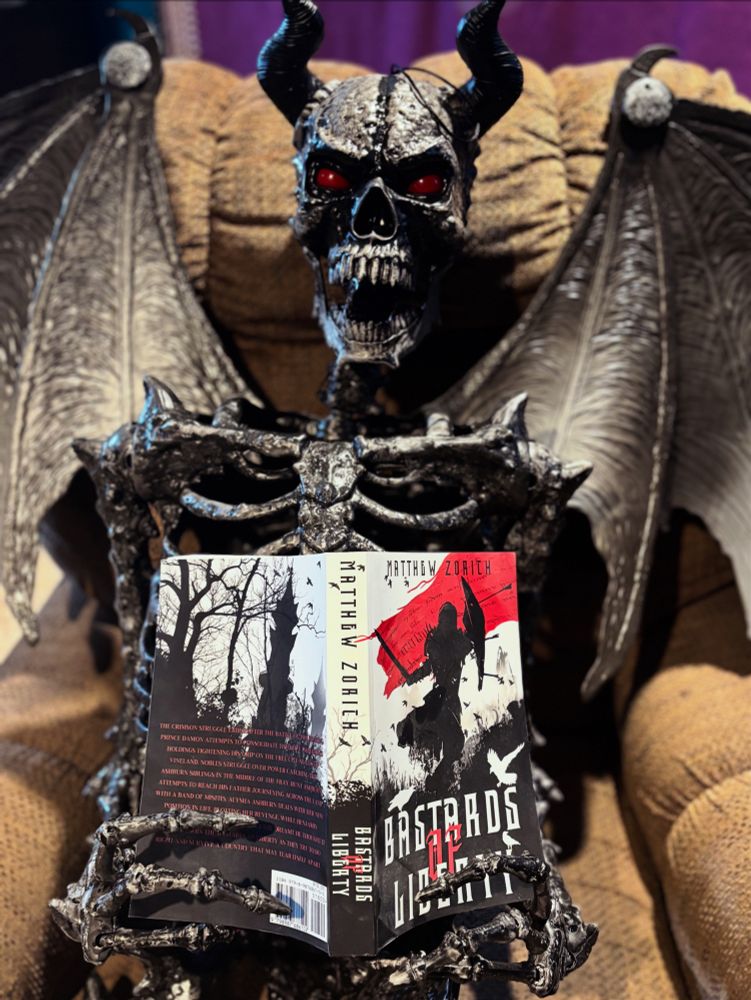 Skelton holding a book