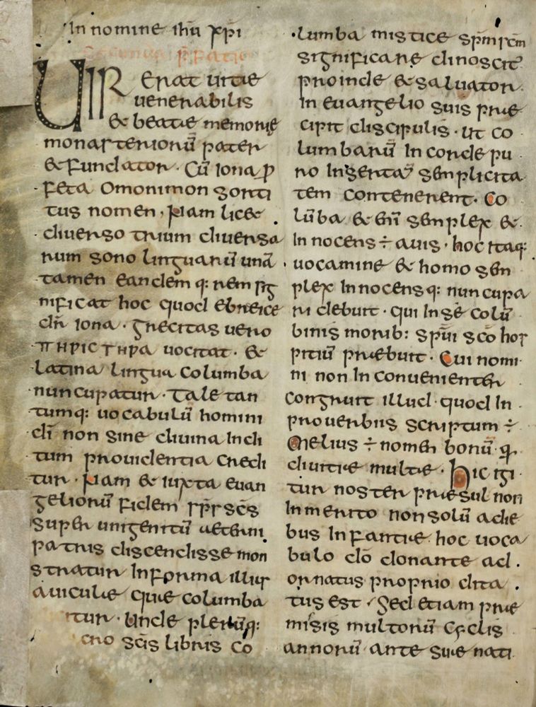 Schaffhausen, Stadtbibliothek, MS Gen. 1, p. 2. Manuscript text in two columns of Insular minuscule with large UIR to start the text. Black ink with orange washes in some in-text initials.