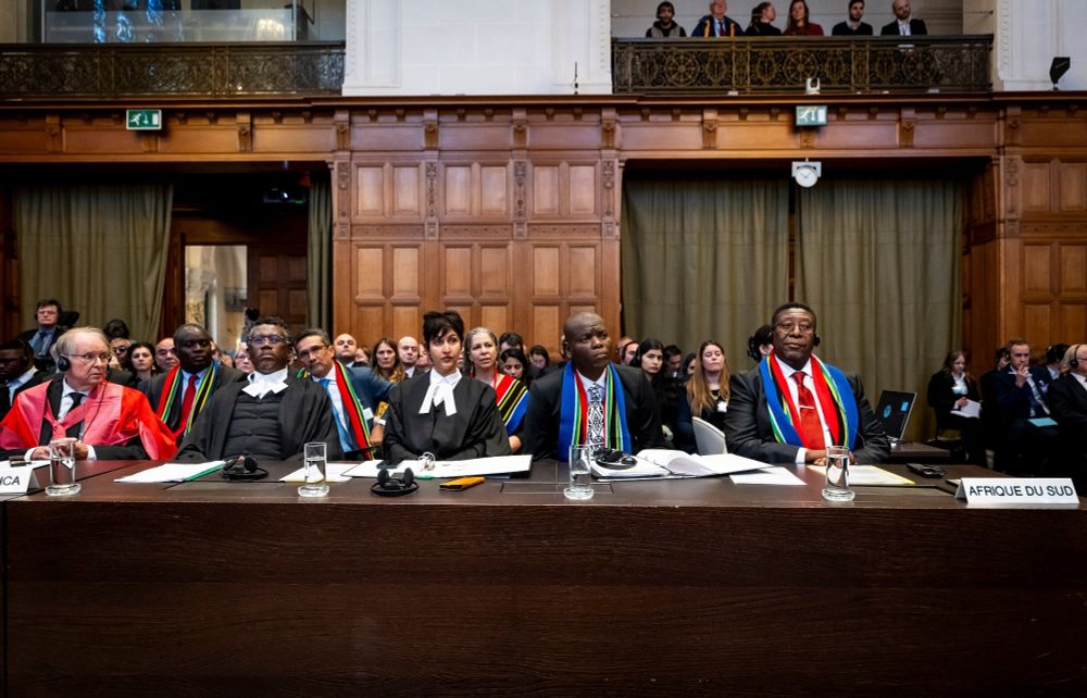 The legal team of South Africa in The Hague. A picture showing five members - the ambassador to the Netherlands, the minister of Justice and three senior councils
