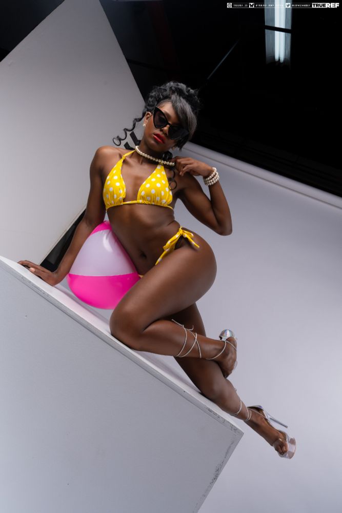 art reference of a woman in a swimsuit laying down.