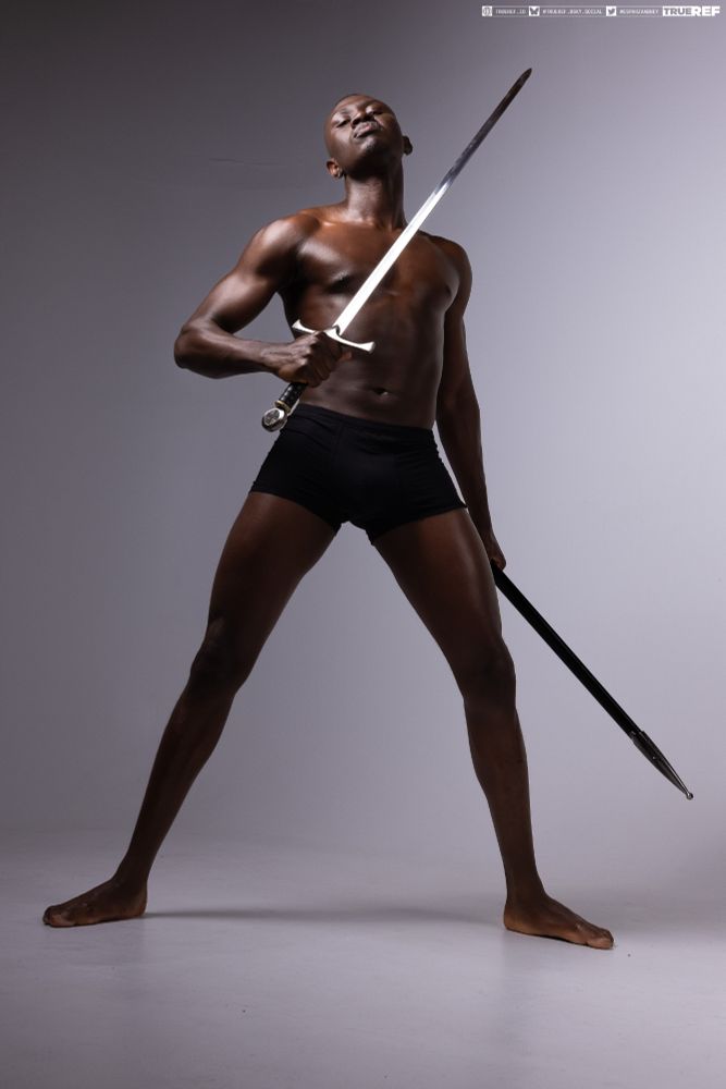 Pose references of a man holding a sword. 
