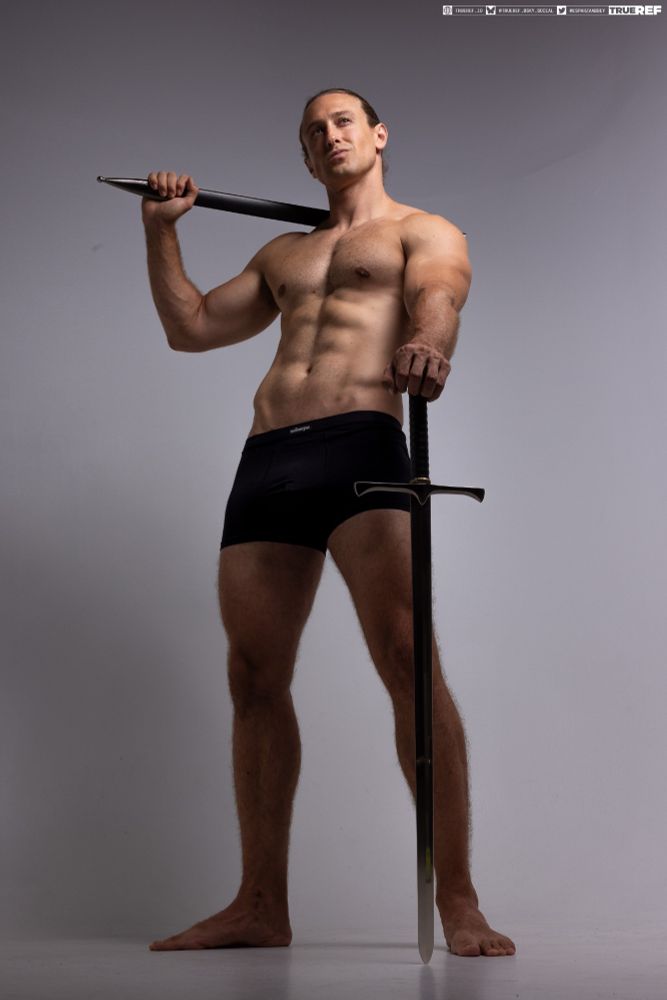 Art pose reference of a man holding a sword on his shoulders