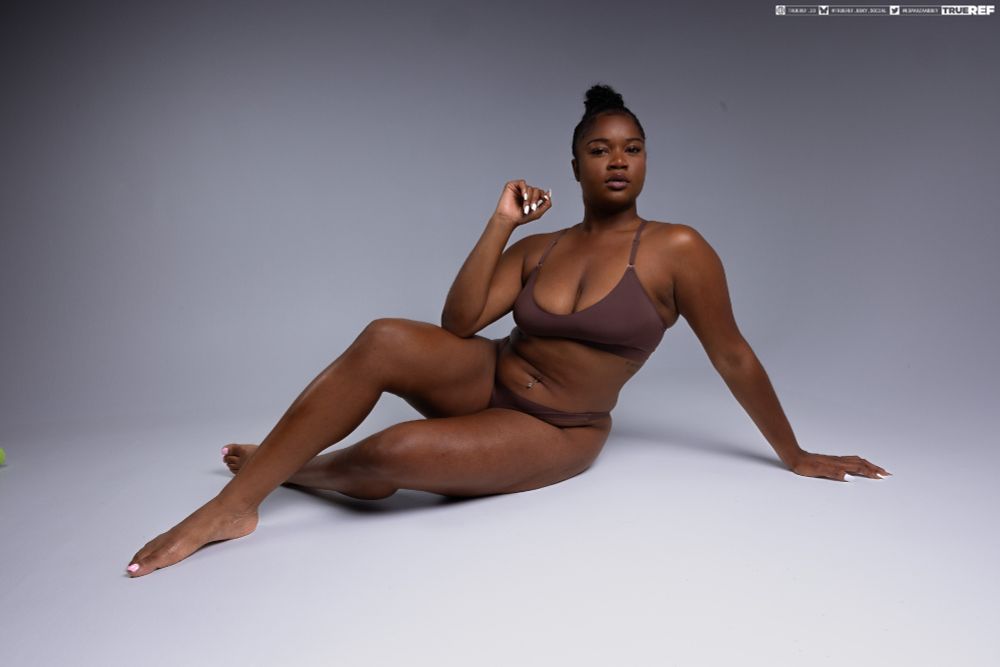 art pose reference of a woman laying on the floor.