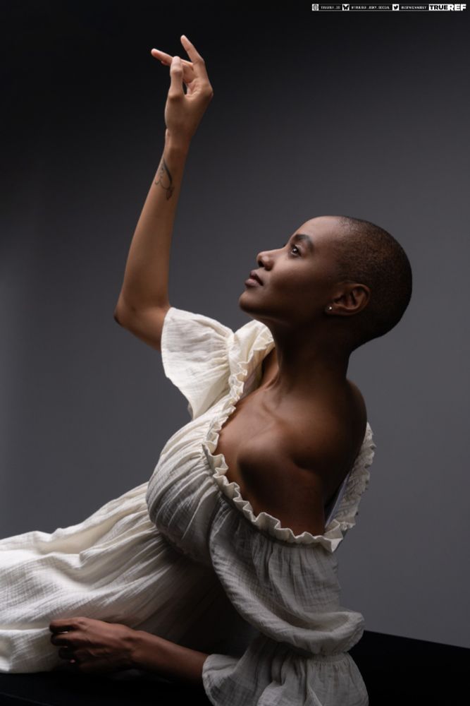 Pose reference of a woman laying down and reaching up to the sky. 