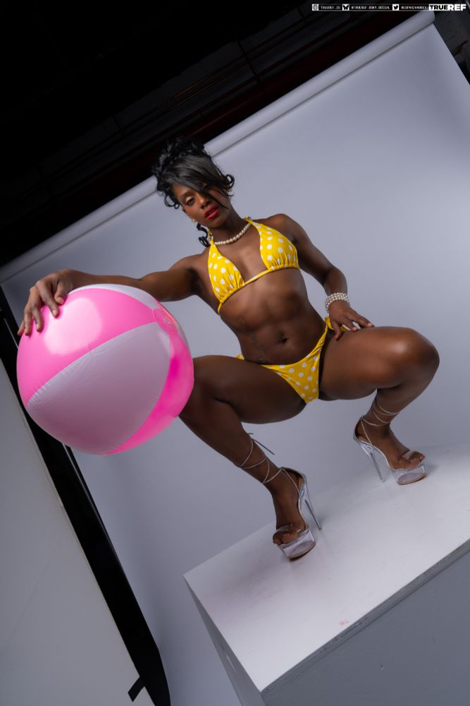 art reference of a woman in a swimsuit crouching. 