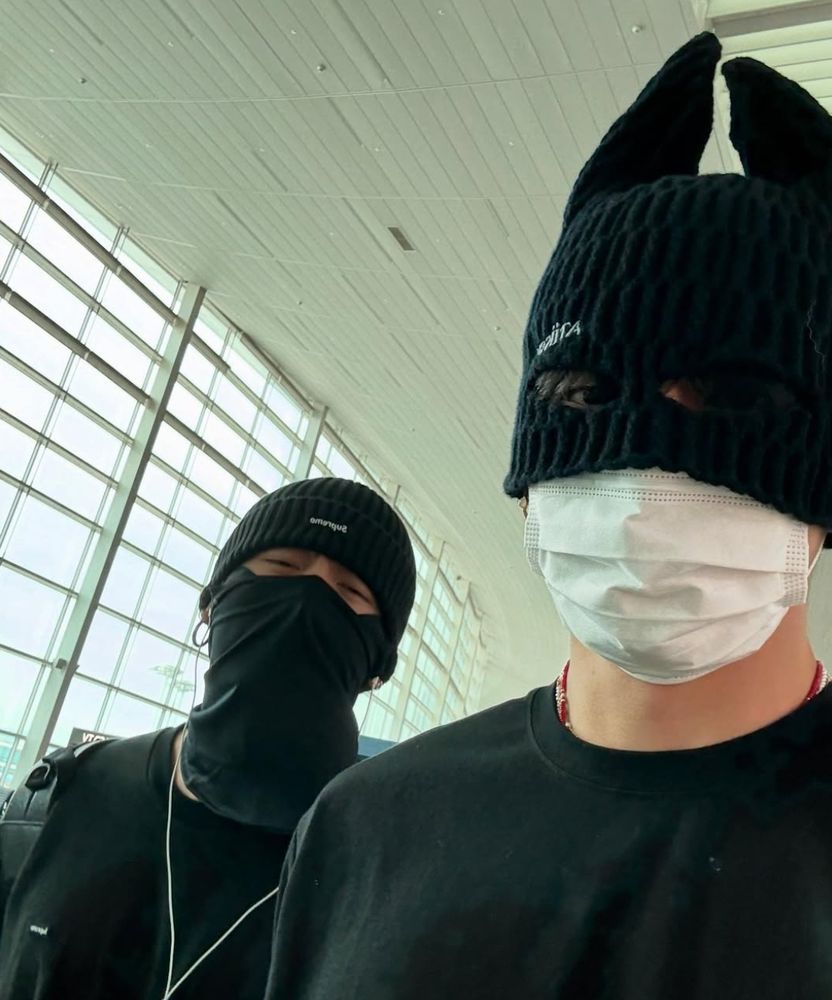 Walkinf with Jungkook, both with mask and beanie