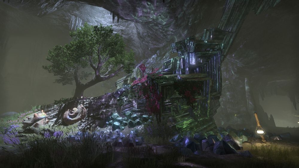 A small spot in a cave with bismuth rocks and a tree, light cascading down on it.
