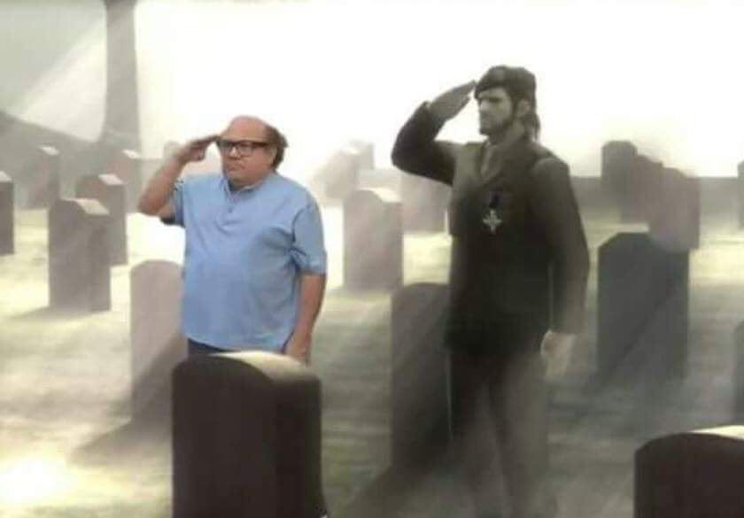 Danny devito and naked snake / big boss salute in a military cemetery