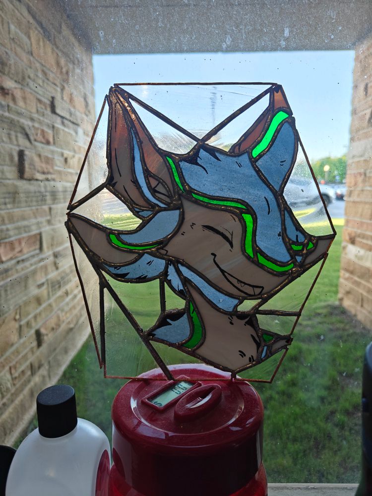 a picture of flynn as a stained glass window