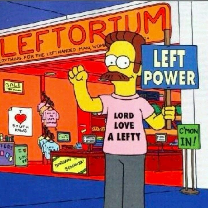 Ned Flanders stands in front of his Leftorium shop