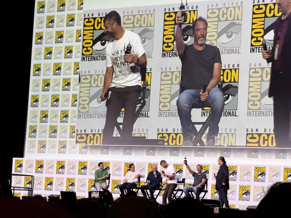 Trey Parker raises his Inkpot award 