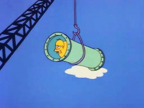 Homer Simpson stuck in a slide 