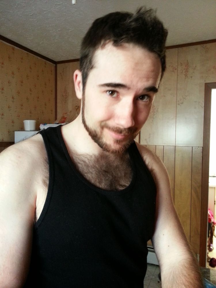 Cute Dorky white man in a black undershirt