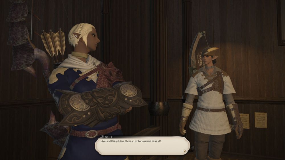 Silvairre in the Archer's guild saying "Aye,  and this girl,  too. She is an embarrassment to us all!"