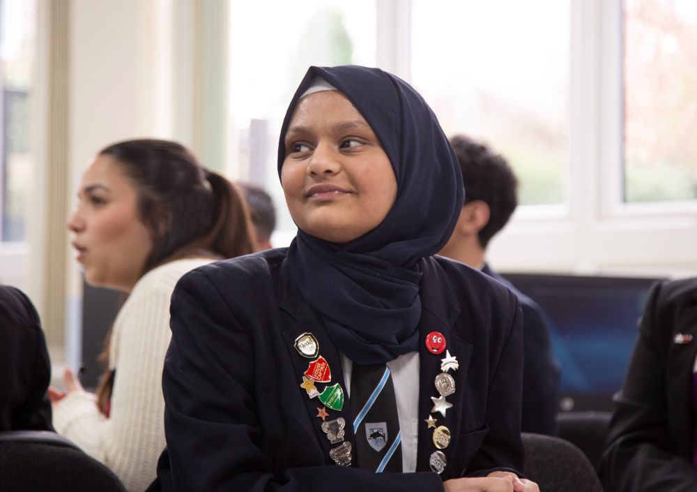 Student from Hall Green School listening to a student-led presentation.