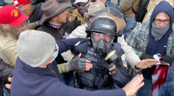 Calitol police officer being crashed and beaten by j6 rioters for trump