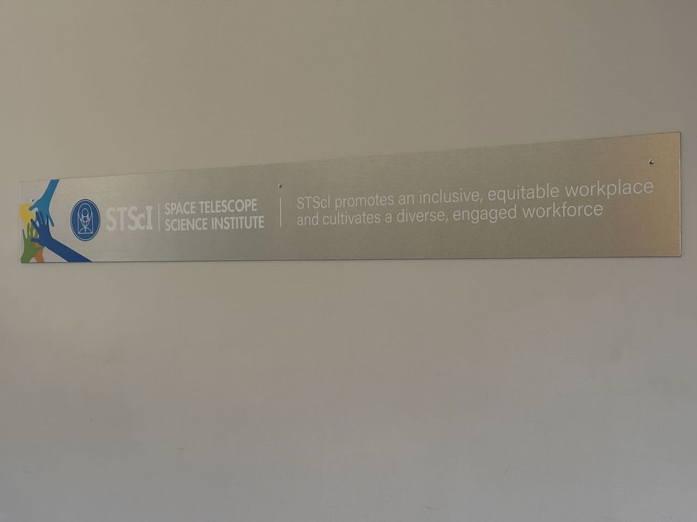 Lobby plaque with motto proclaiming the virtues of inclusiveness, equitability, diversity, and engagement.