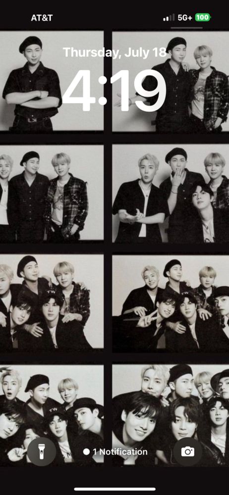 Phone lock screen of black and white photos of BTS Members