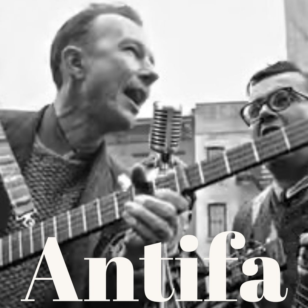 folk musician Pete Seeger playing his banjo at the Newport Folk Festival. Superimposed over the photo is the word “antifa.”
