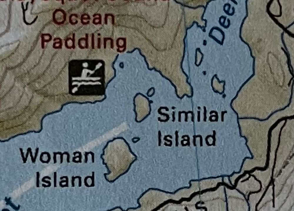 Map showing two islands, Woman Island and Similar Island