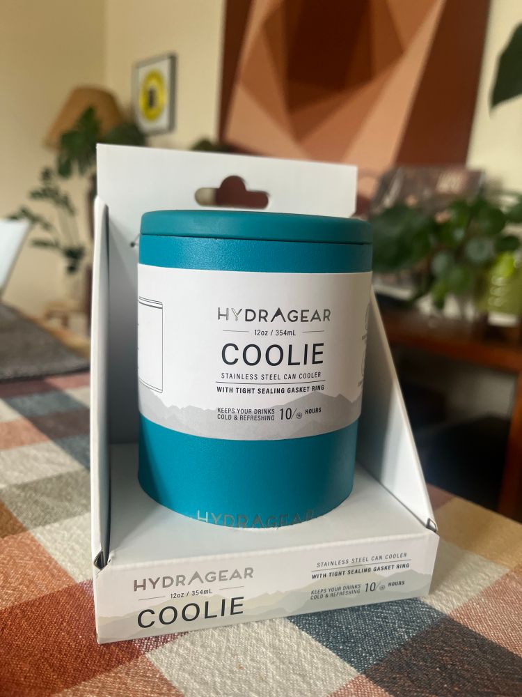 Photo of a beverage cooling sleeve with the name brand “Coolie”.