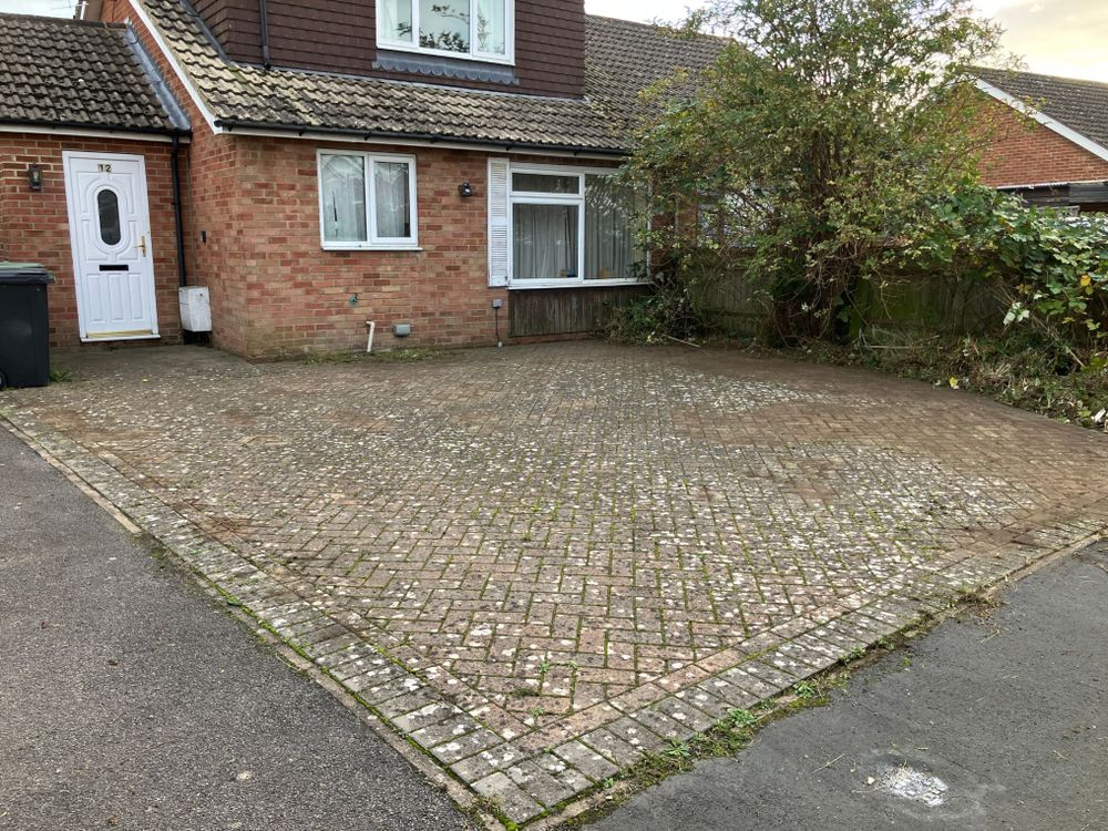 2 hours later... a very less weedy front drive but still so much to do.