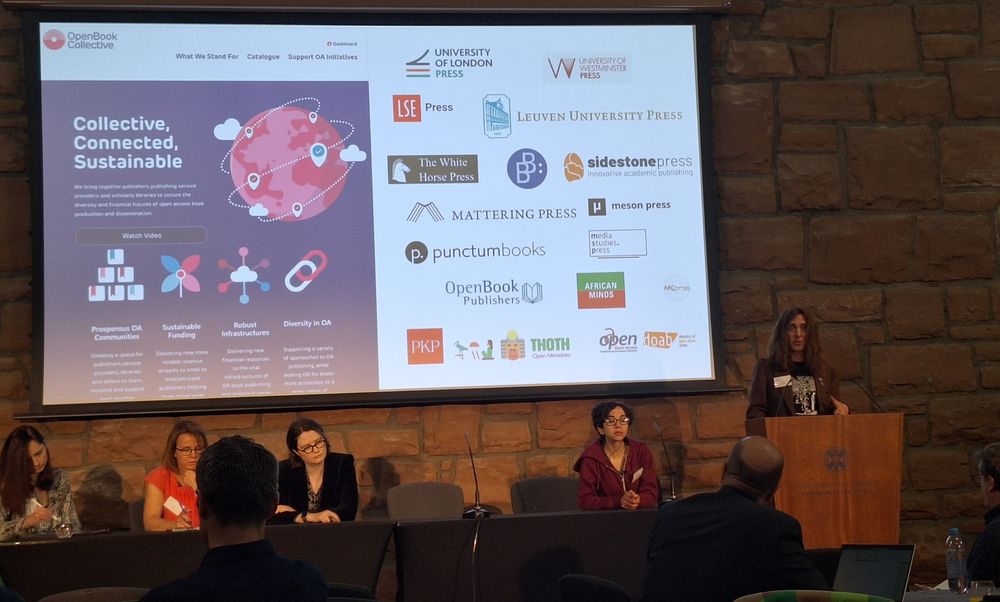 A photograph of Kevin Sanders presenting at the Edinburgh Open Research Conference 