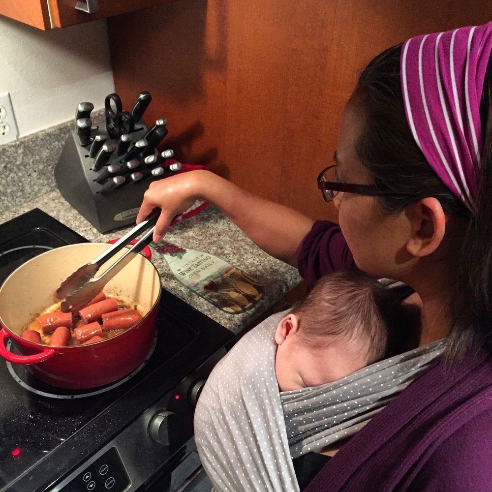Cooking sausages with my kid.