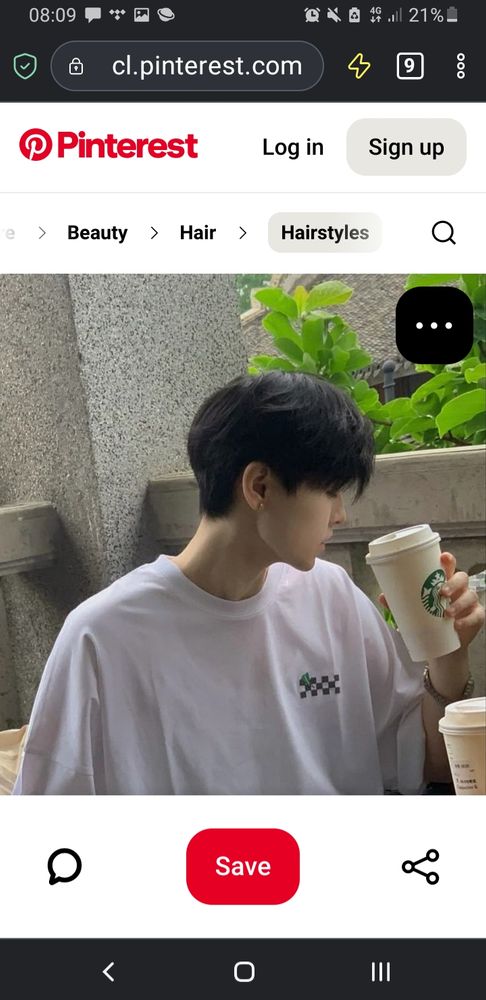 Screenshot of pinterest. Said haircut: long fringe, ears uncovered, volume high in the back then tapered. Drinking starbucks on a patio in an oversized white tshirt, so truly default.