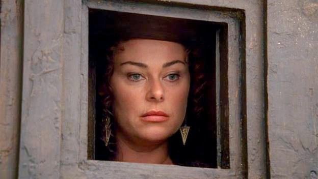 A woman looks out her window to see if her neighbors have repented their sins 