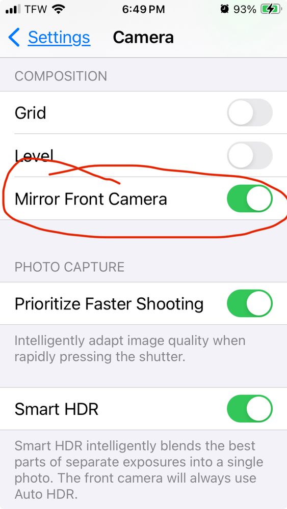 Screenshot of iOS camera setting screen. Under the composition subheading the option to Mirror Front Camera is turned on and circled. 