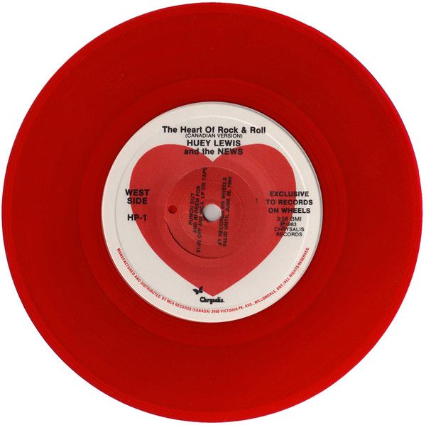 Beautiful red vinyl 45 of "The Heart of Rock & Roll (Canadian Version)" by Huey Lewis and the News.