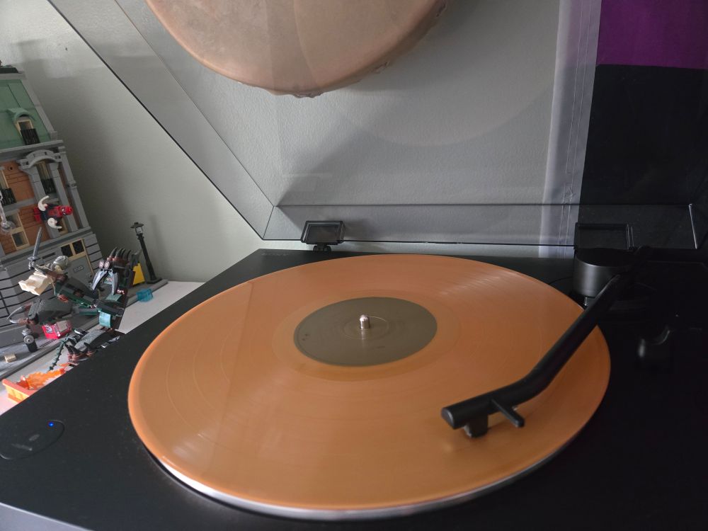 A golden record playing on my turn table. 