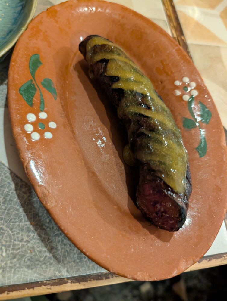 Finished chouriço - served with a sweet orange sauce, like a marmalade.  All other sausage is playing for second.