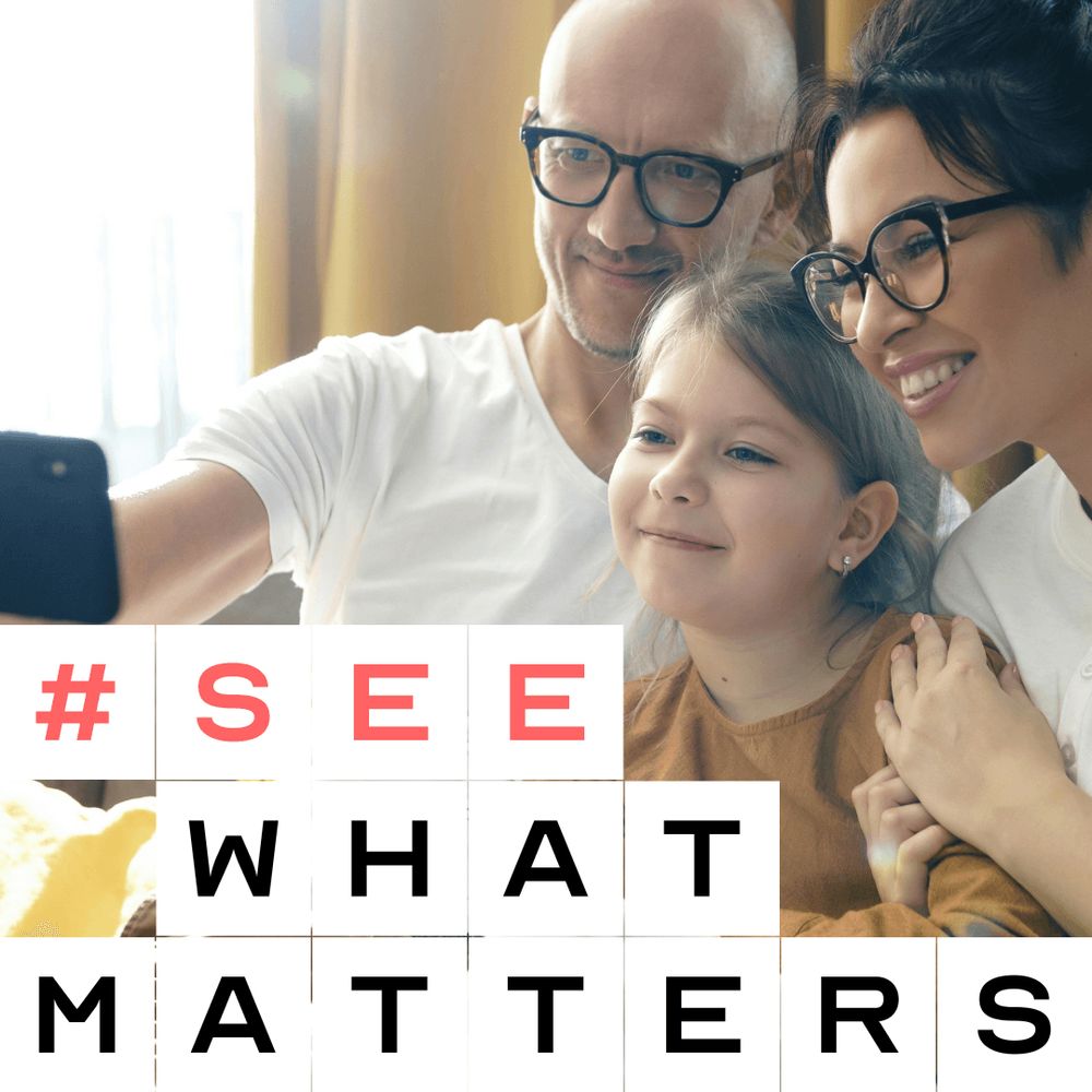 Parents and a child smiling and looking at a camera in a brightly lit room, with the text "#SEE WHAT MATTERS" overlaid at the bottom.