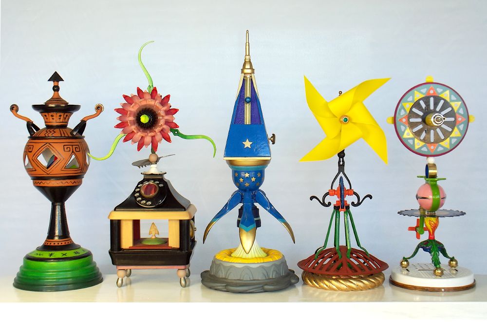 A group of five assemblage sculptures by Charlayn von Solms from the series "The Lost Consonants" inspired by Hesiod's Theogony. From left is "Kleio Play", "Mnemosyne Genos", "Zeus Theos", Hesiod Ergo" and "Melpomene Act".