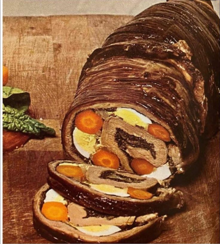 A Time-Life Library of Cooking illustration of a flank steak stuffed with whole carrots and hard-boiled eggs.