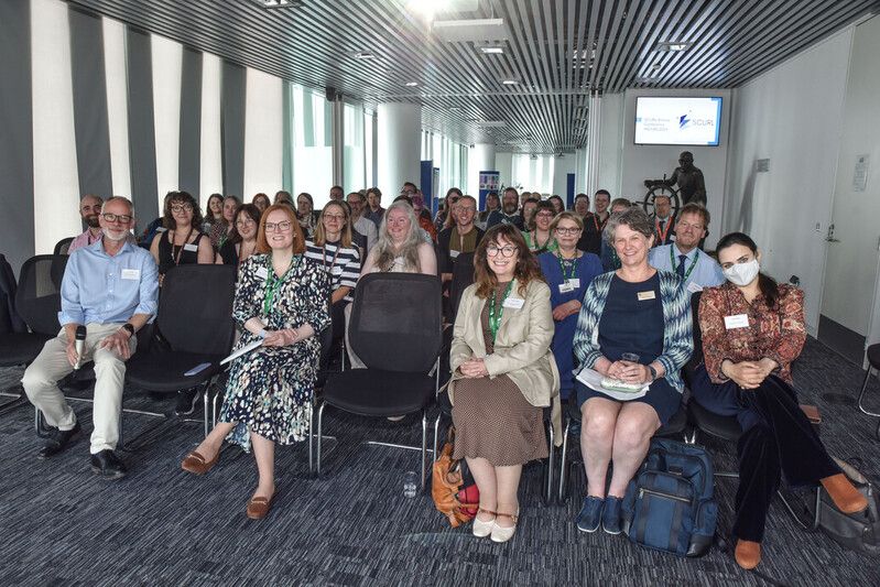 Group shot of the SCURL 2025 audience in the Craig Suite,The Sir Duncan Rice Library.