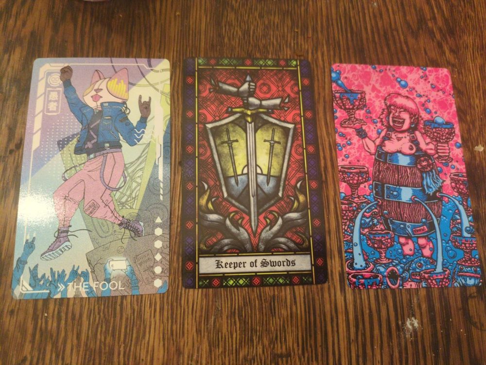 The fool, keeper of wwords, and I have no fucking idea what the last one is, I think it's probably 10 of cups?