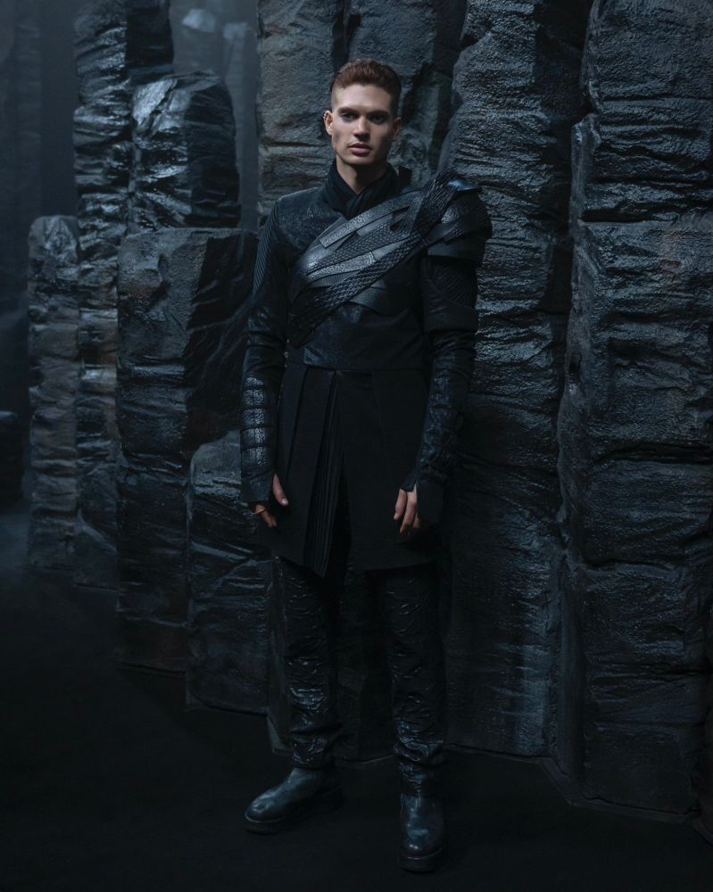 Rand dressed in the dark timeline, wearing goth attire.