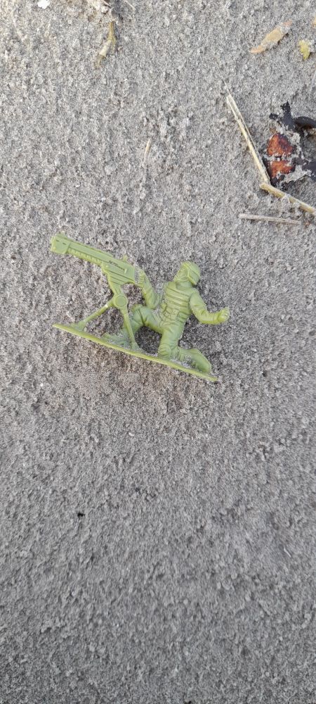 Light green machine gunner plastic toy soldier