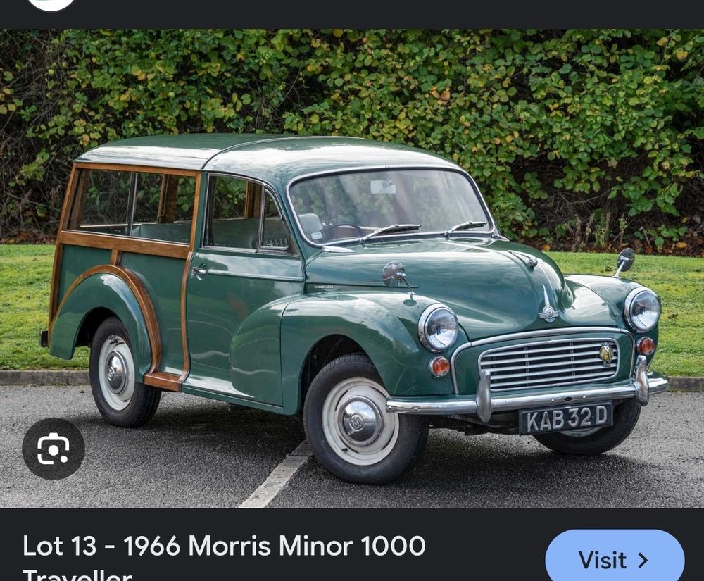 The 1966 Morris Minor 1000, a round green isb car with an almost looking paint job in the back  with doors only one on the front and little tiny wheels with a license plate in the front reading KAB32D
