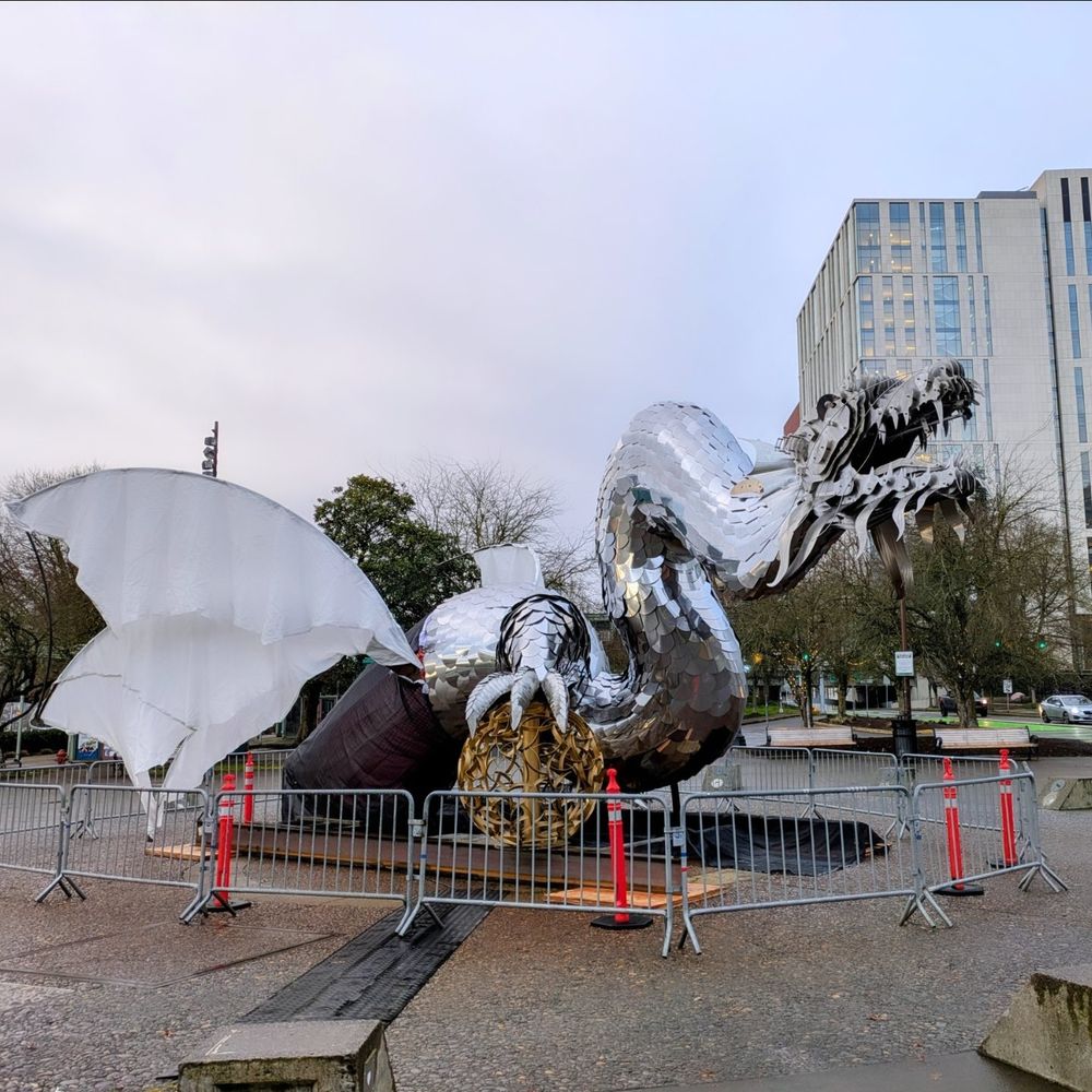 A dragon appears on the waterfront. 