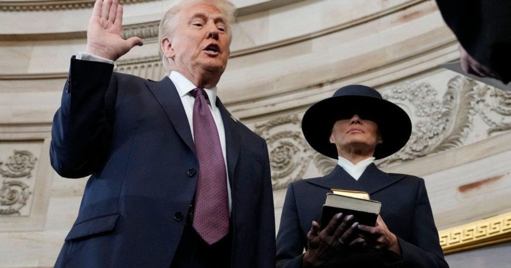 Images from the inauguration show President Trump did not put his hand on a Bible as he was sworn in by Supreme Court Chief Justice John Roberts. It is not required in the Constitution.