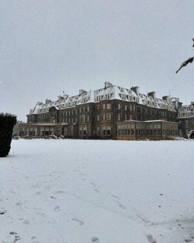 The Gleneagles Hotel covered in a thick layer of snow.